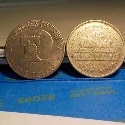 Eisenhower Centennial dollar and a BOOM TOWN Token.