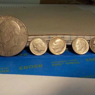 Eisenhower Centennial dollar and 4 Roosevelt dimes.