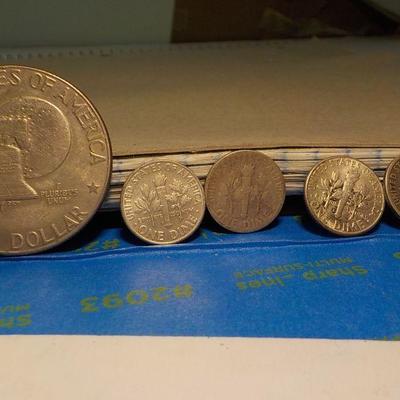 Eisenhower Centennial dollar and 4 Roosevelt dimes.