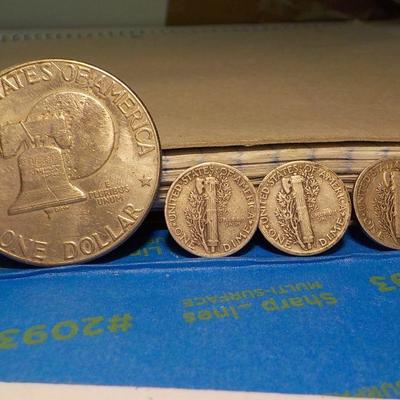 Eisenhower Centennial dollar and 3 mercury dimes (war).