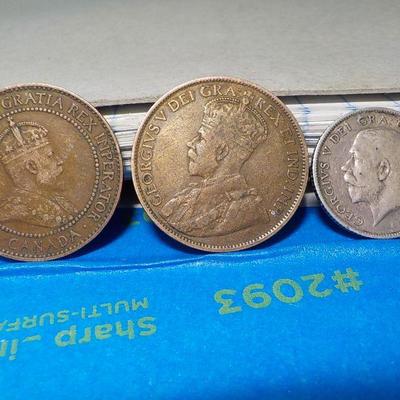 English six pence 1914, 2- canada one cents 1909, 1912.