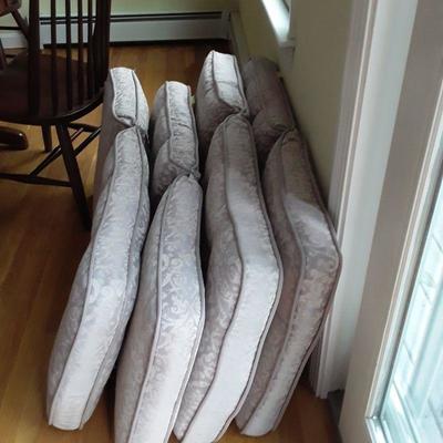 Lot four tan outdoor cushions