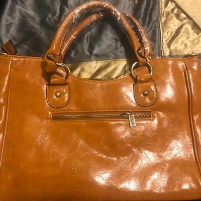 â€œCoachâ€ branded ladies purse (unsure of authenticity)