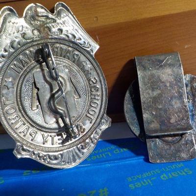 Real school saftey badge and Broke dollar holder.