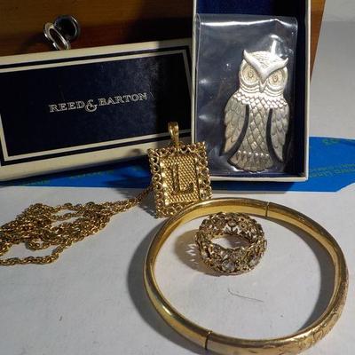 Reed and Barton sterling owl, Gold plated L. necklace, Sterling ring, Gold plated bracelet.