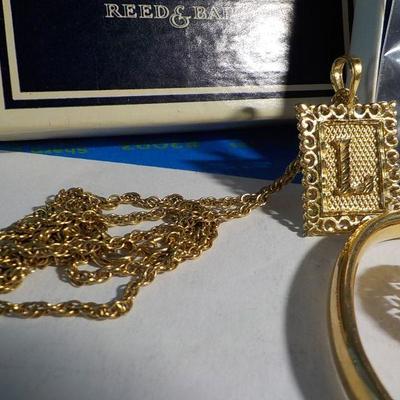 Reed and Barton sterling owl, Gold plated L. necklace, Sterling ring, Gold plated bracelet.