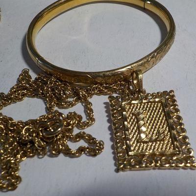 Reed and Barton sterling owl, Gold plated L. necklace, Sterling ring, Gold plated bracelet.
