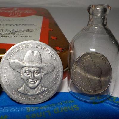 4 - collector items, BSA 1900's pin, Hop a long Cassidy and Nickel in bottle.