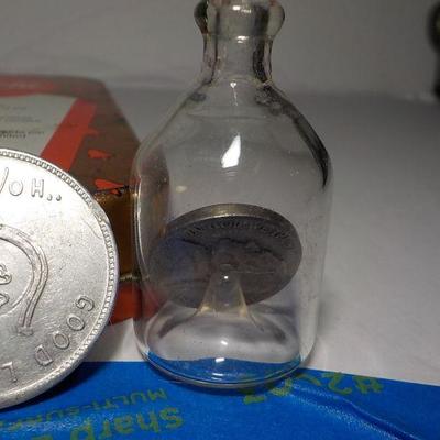 4 - collector items, BSA 1900's pin, Hop a long Cassidy and Nickel in bottle.