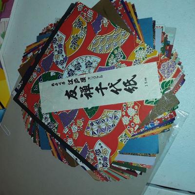 lot origami books and paper