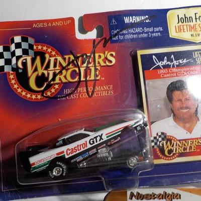 Nascar Legend  " John Force" signed .