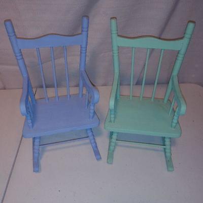 Lot of 7 dolls & three doll chairs