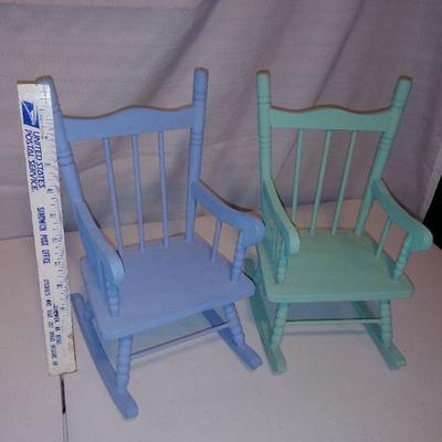 Lot of 7 dolls & three doll chairs