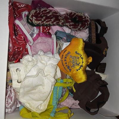 Lot two boxes of build a bear clothes and accessories