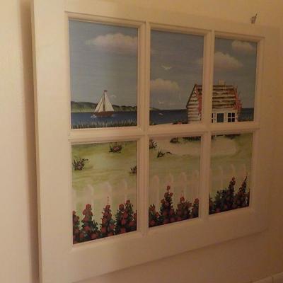 Wood art window with pic. of sea side .