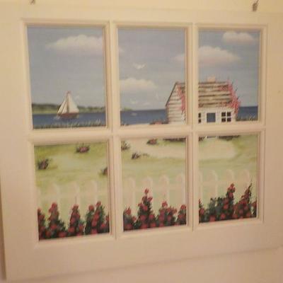 Wood art window with pic. of sea side .