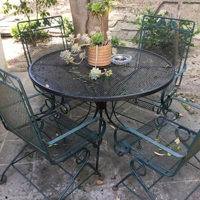 P-102 Vintage rod iron black table with green chairs