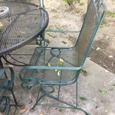 P-102 Vintage rod iron black table with green chairs