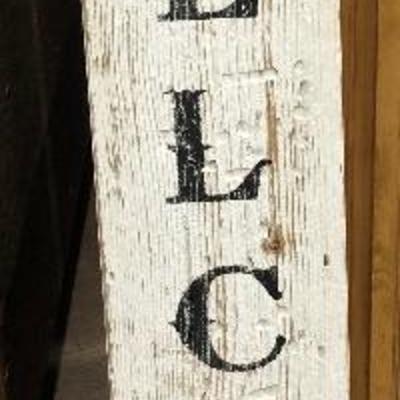 Hand painted fence board welcome sign 