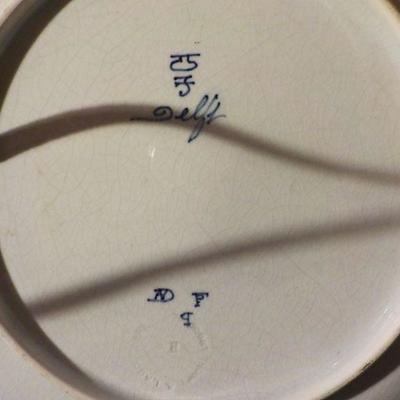 4 - piece Delft China and figurine set.