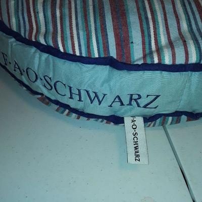 F.A.O. Schwarz 9 toy puppies and dog bed