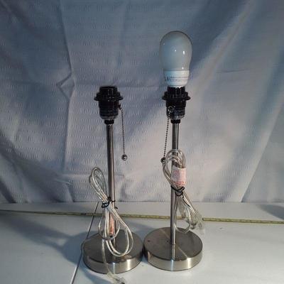 Pair of silver tone table lamps