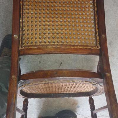 Walnut cane rocking chair