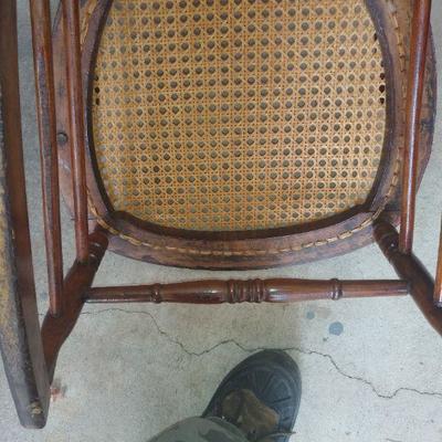 Walnut cane rocking chair