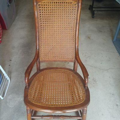 Walnut cane rocking chair
