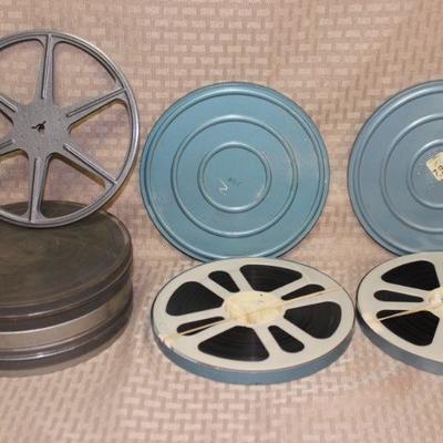 2 Home Movies from the 1950s and 3 empty reel tins.