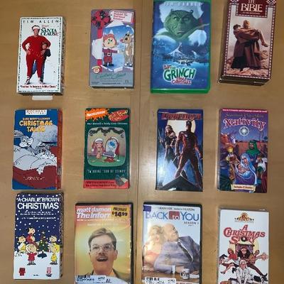 Assortment of 10 VHS Tapes and 2 DVDâ€™s