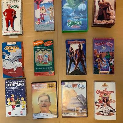 Assortment of 10 VHS Tapes and 2 DVDâ€™s