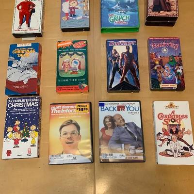 Assortment of 10 VHS Tapes and 2 DVDâ€™s