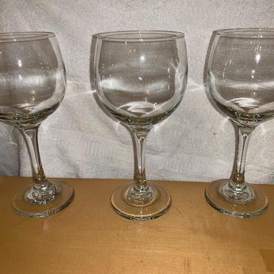 Assortment of Items Wine Glasses Teacup And Saucer