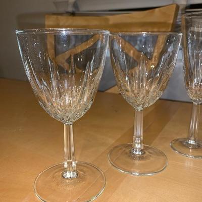 Assortment of Items Wine Glasses Teacup And Saucer