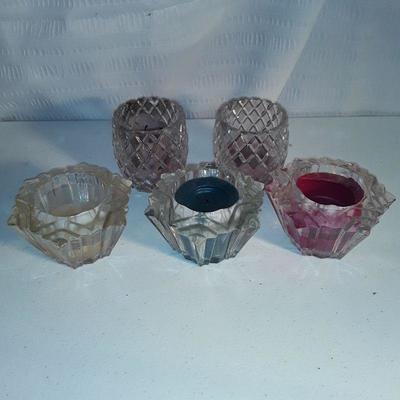 Lot colorful vases and candle holders