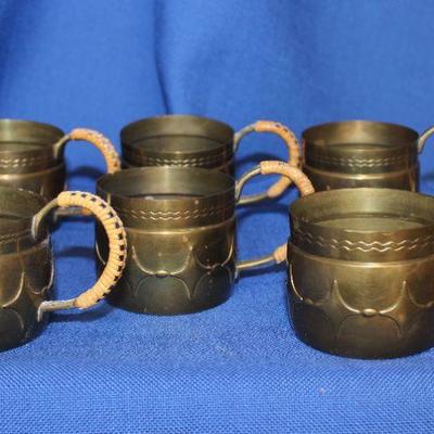 Lot 25: 6 Vintage WMF Tea Cup Holders Brass/ Copper/ Rattan $40