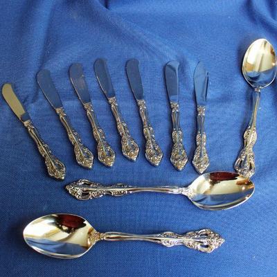 Lot 108: Oneida Michelangelo Stainless 6 Spreaders, 1 Master Butter, 3 Serving Spoons $45