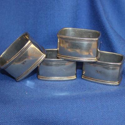 Lot 112: 4 Pewter Napkin Rings, Marked 95%  $10
