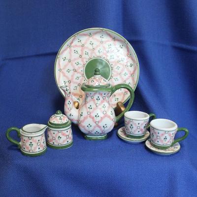 Lot 114: Child's Tea Set $20