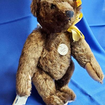 Lot 14: Steiff 1909 Classic Teddy Bar With growler 13"  NOTE: Bear is in excellent condition with all Tags, however, growler is more...
