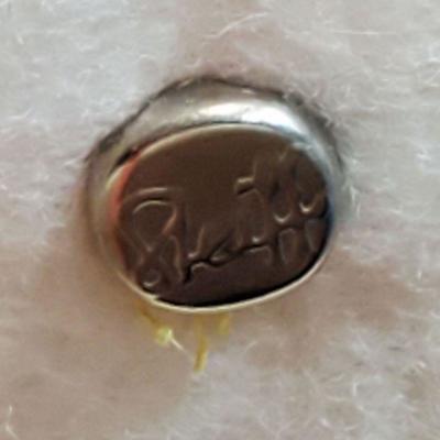 Lot 16 button