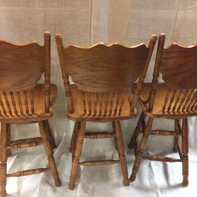 Set of Three Solid Oak Pressback Swivel Counter stools 