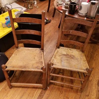 Set of 2 antique rawhide chairs