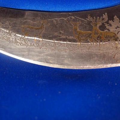 Engraved sheath knife with sheath