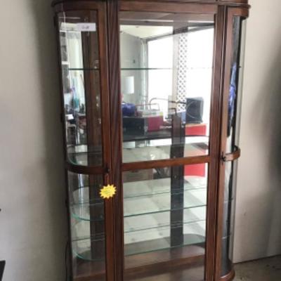 #G28.  Lighted display cabinet