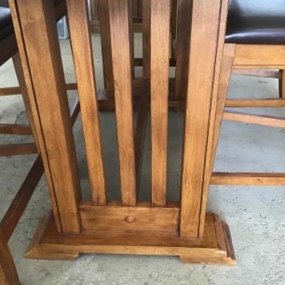 #G48.  High top wood table with six chairs