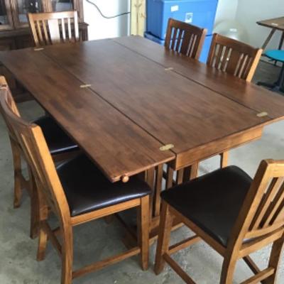 #G48.  High top wood table with six chairs