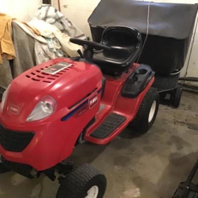 #A86.  2006 Toro riding mower with 48â€ deck, bagger and lawn sweeper