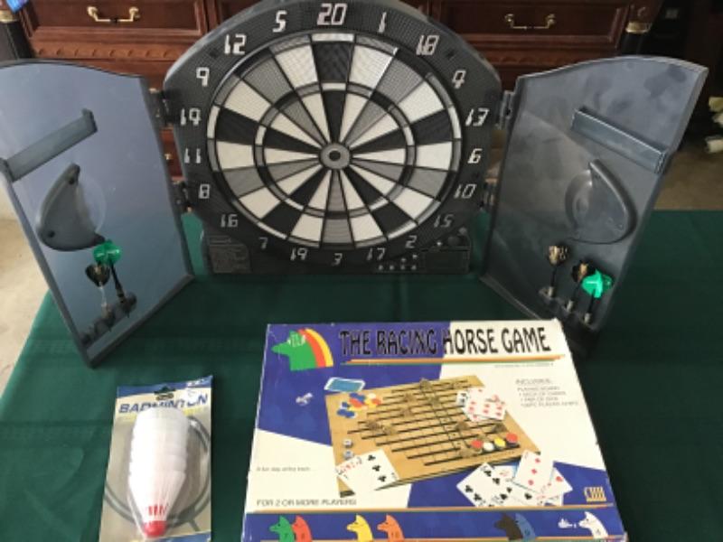 gar13. Dart board, racing horse game and birdies Dart board, racing